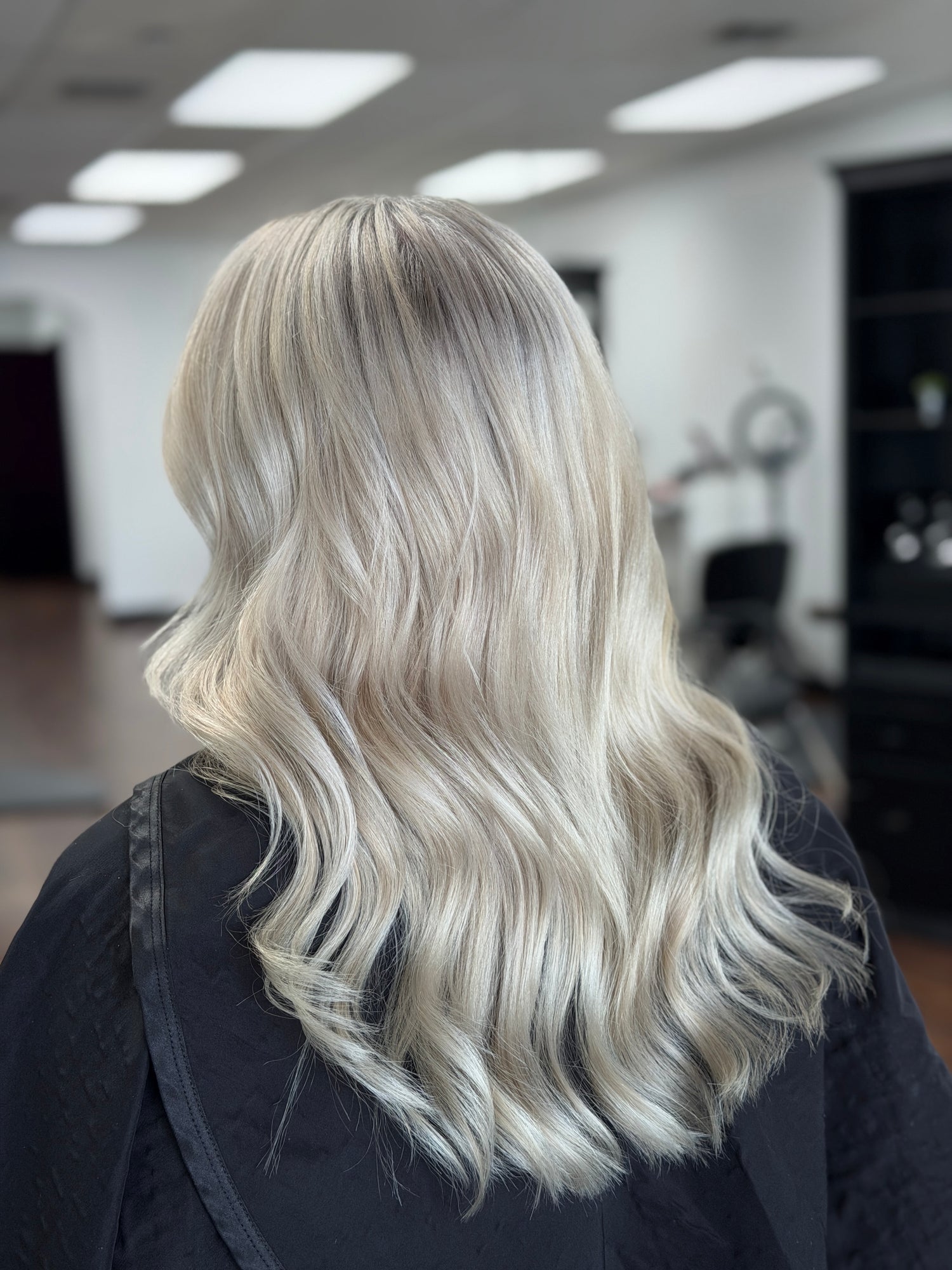 Cool blonde hair color correction result at Color Couture Salon in Kennewick, WA